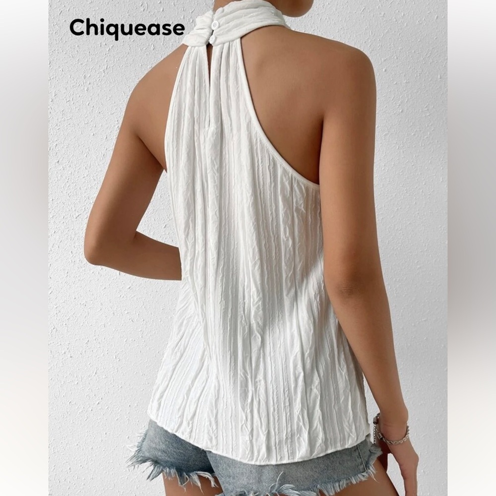Chiquease Solid Criss Cross Halter
Blouse size large - Picture 2 of 9